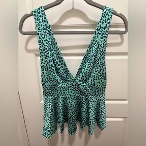 NWT Urban Outfitters. Cheetah Print Peplum Crop Top. Mint. Size Small.